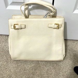 Cream colored small tote bag